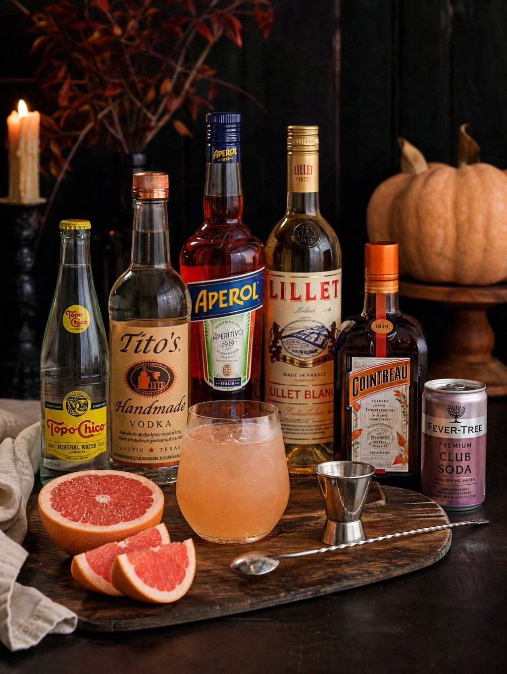 measured ingredients for halloween mocktail laid out on counter with kitchen props